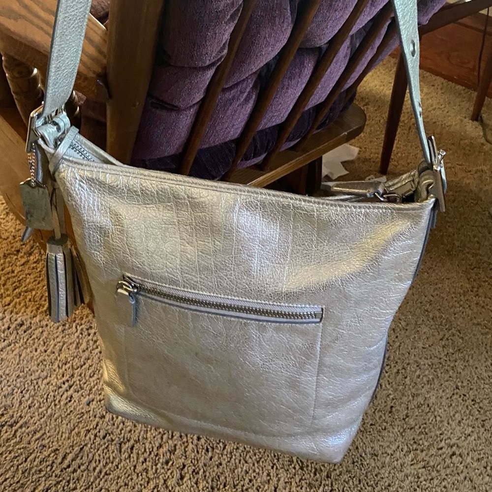Coach Pale Silver Gold Hobo Coach Shoulder Bag with Adjustable Strap and Tassel